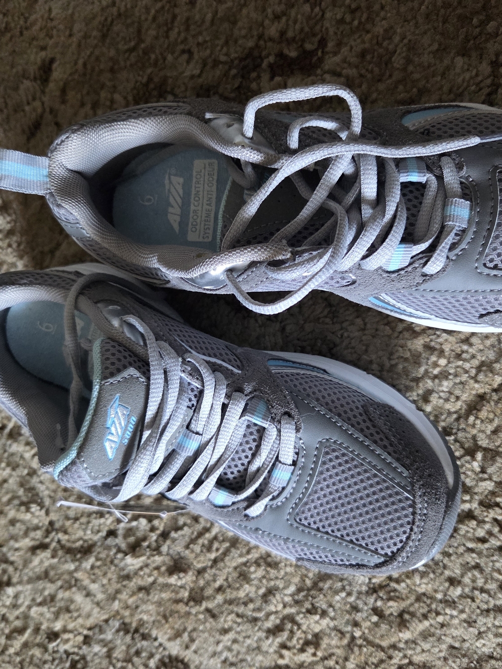 Brand new shoes.Size 6.Avia Youth Gray Sneakers with Light Blue Accents.